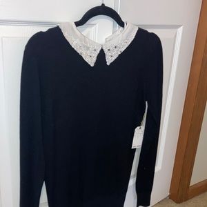 Women’s Black sweater with beaded white collar